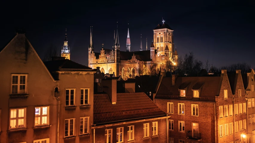 a city that has buildings lit up in the night