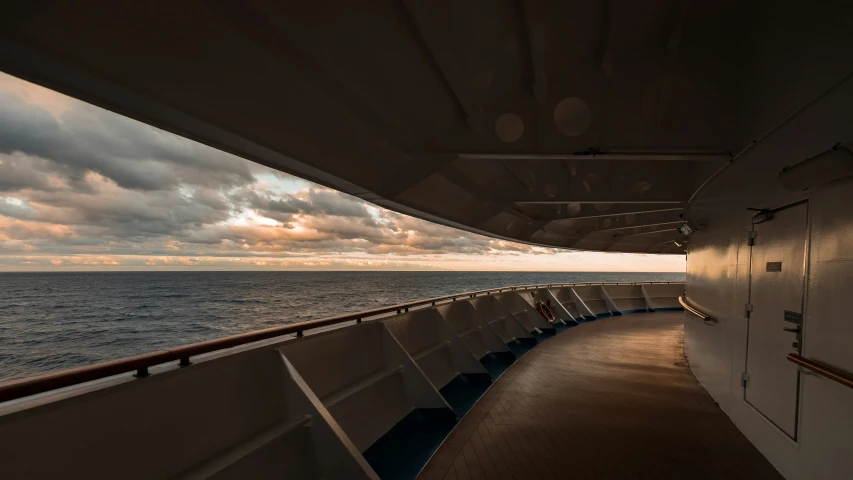 the side of a boat on open water