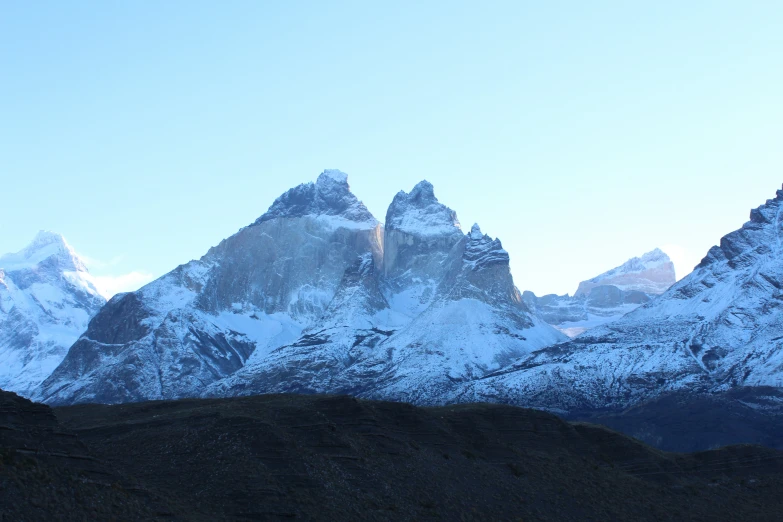 the mountains of the rocky valley are covered in snow