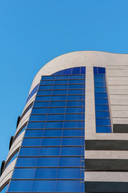 a tall building with some windows next to it