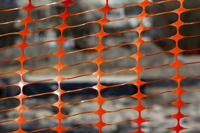 a grate net with a red dotted design