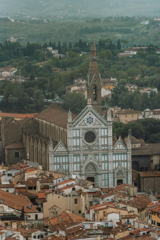 a view of a church in a large city