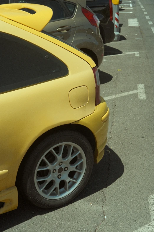 a couple of cars parked in a parking lot