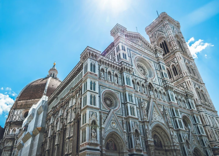 a beautiful view of a building under a bright blue sky