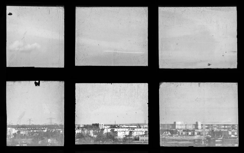 black and white pograph of the city taken out a window