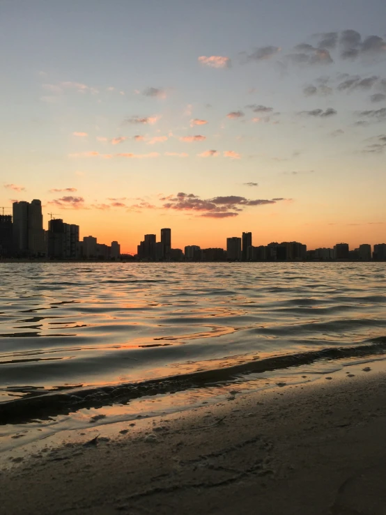 some water and buildings near the shore