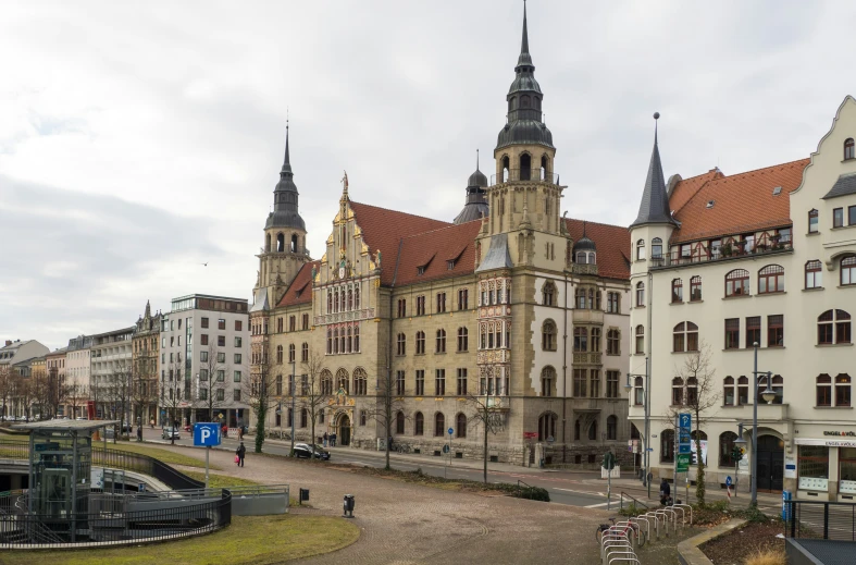 a building with a clock tower next to another building