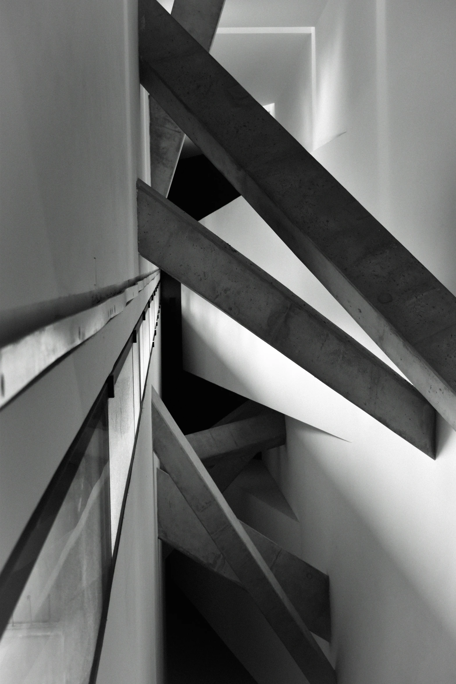 a black and white po of wooden stairs