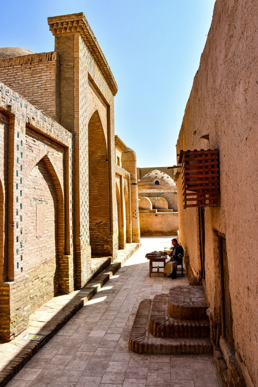 an old, stone courtyard with small pillars on the side