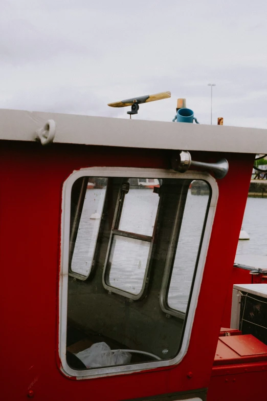 this is a boat on the water with many windows