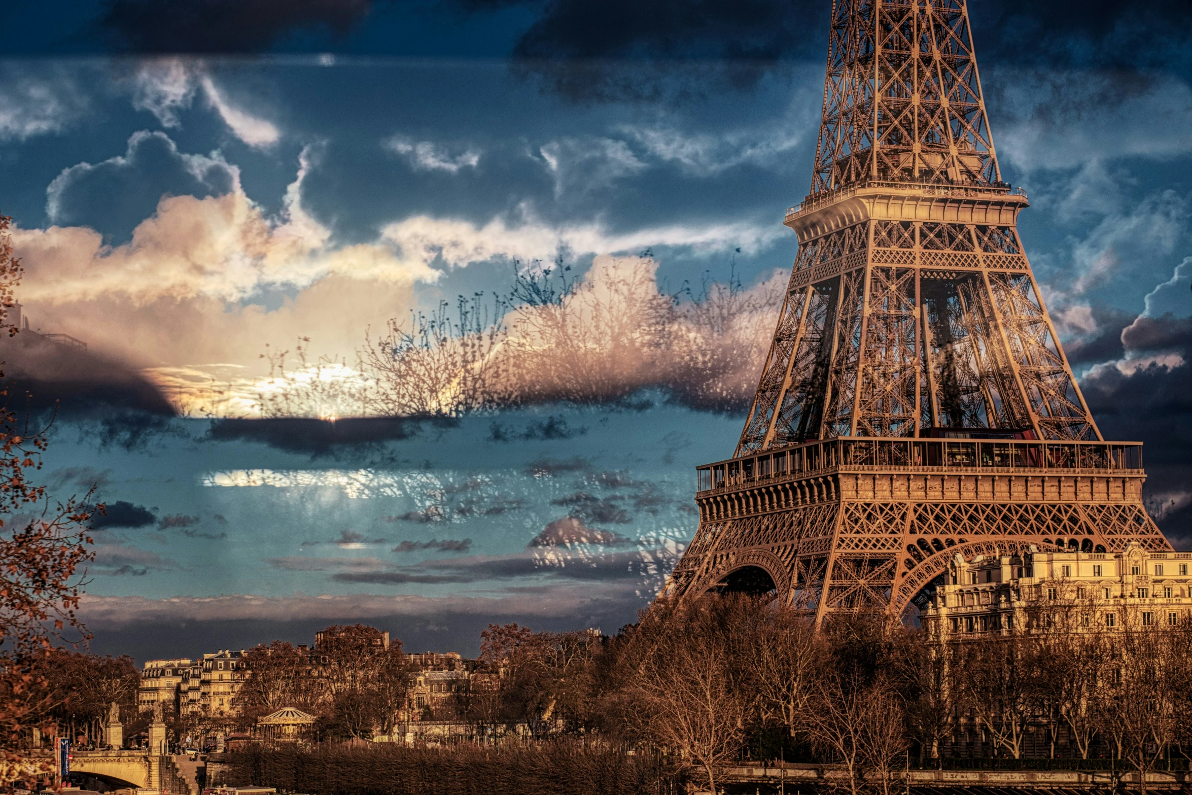 a view from the bottom with the eiffel tower behind it