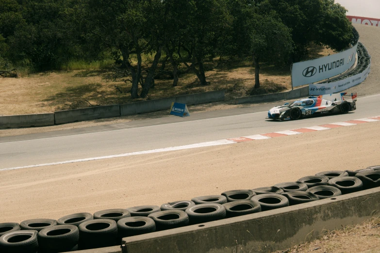 a group of tires sitting next to each other on a race track