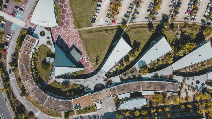 aerial view of an overhead parking lot with parked cars