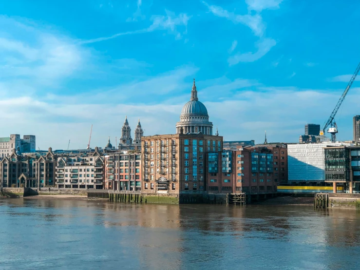 a large body of water near some large buildings