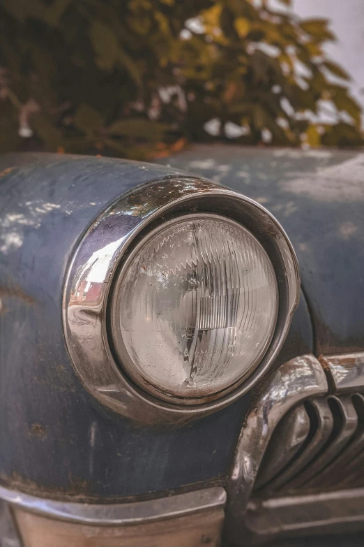 an old car with its license badge visible