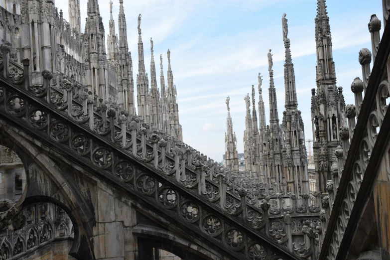 the architecture is ornate and looks old and stone