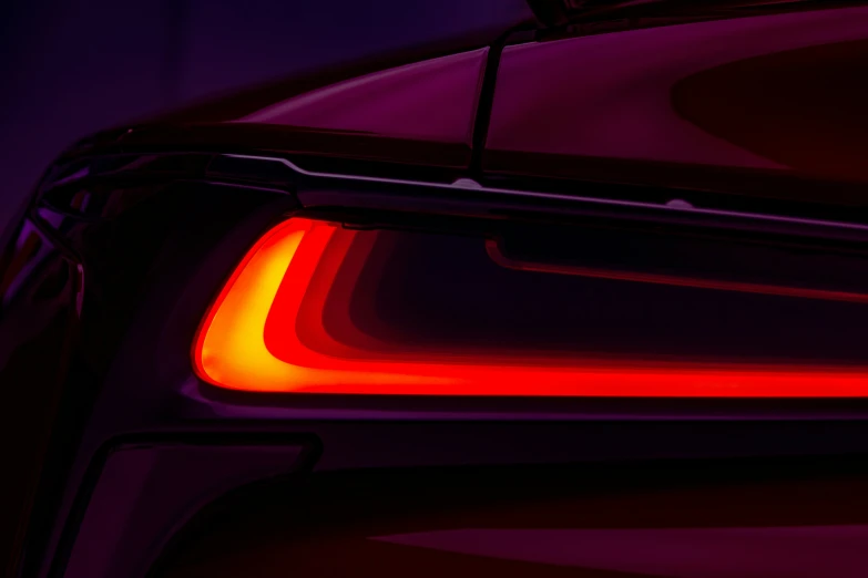 an image of a car with the tail light on