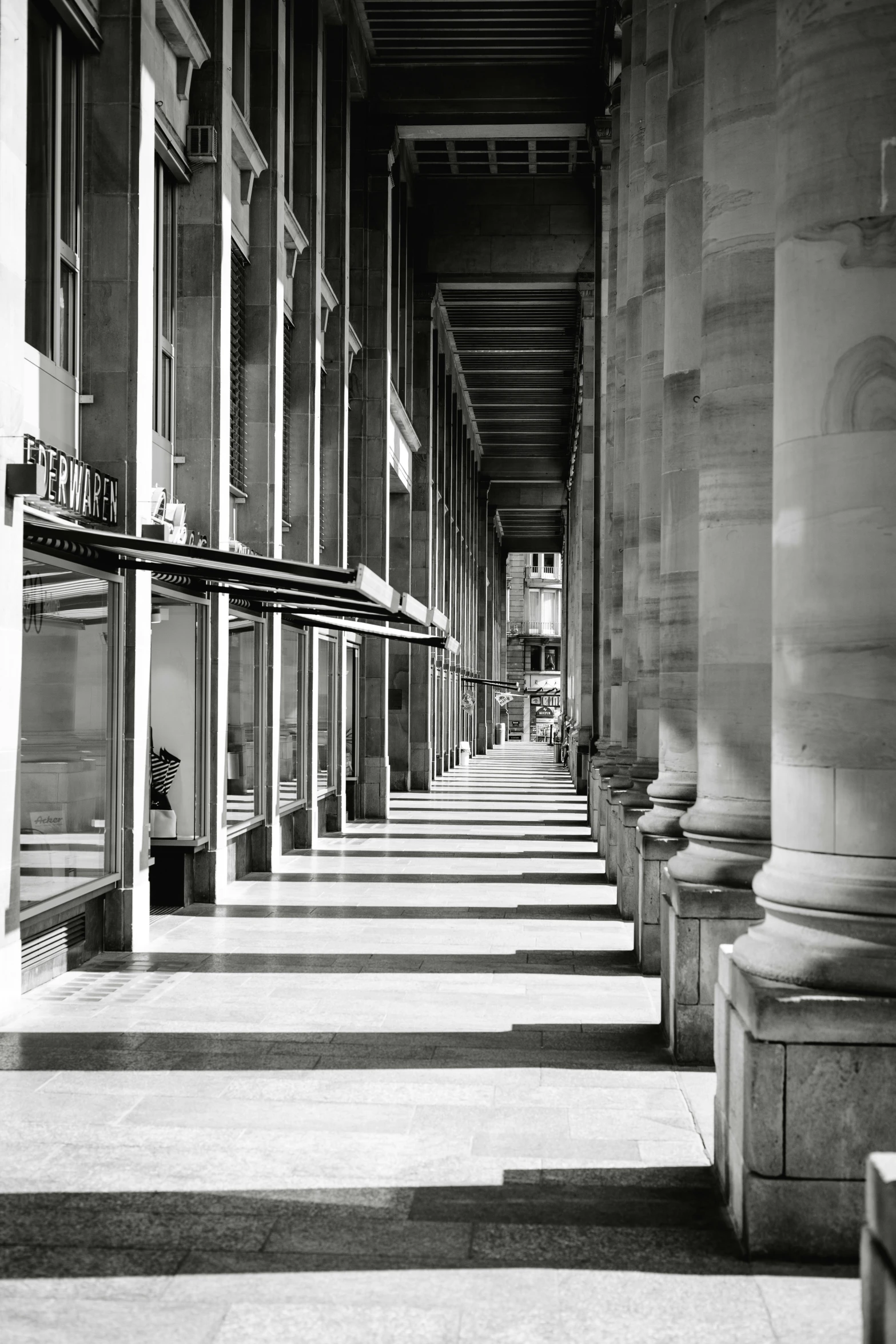 a large building has a lot of windows on the front of it