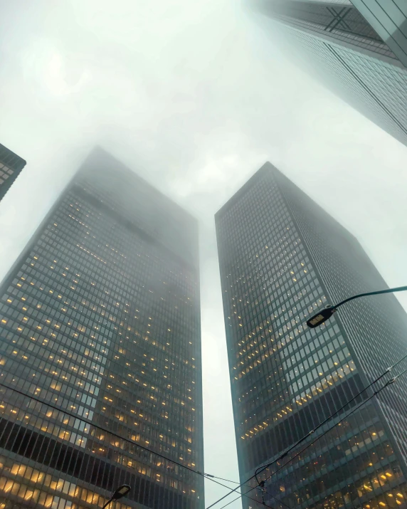 a group of tall buildings towering above a city