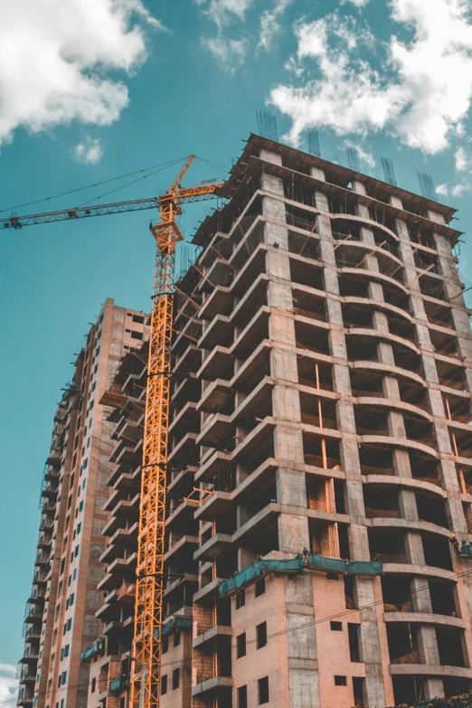 a building with crane and construction work on it