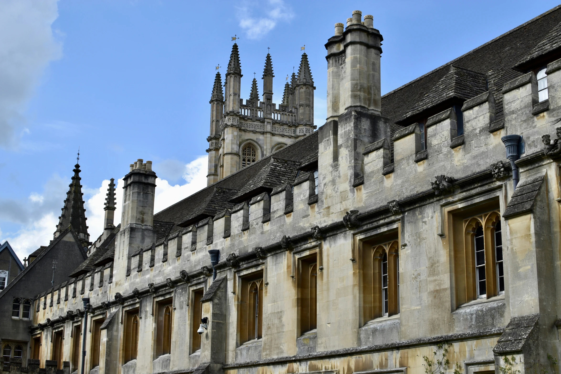 a large cathedral type building with tall towers