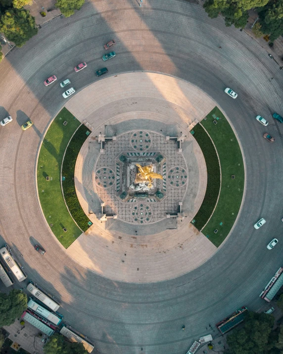 a circular view of the ground and surrounding vehicles