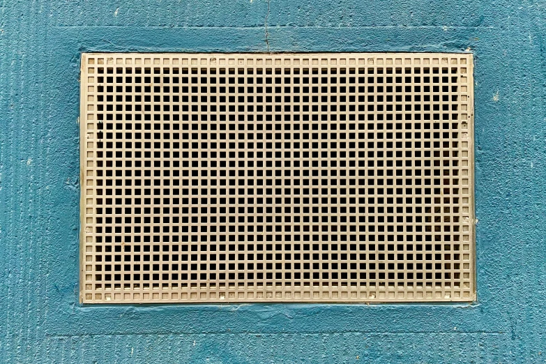 an air vent on the side of a building