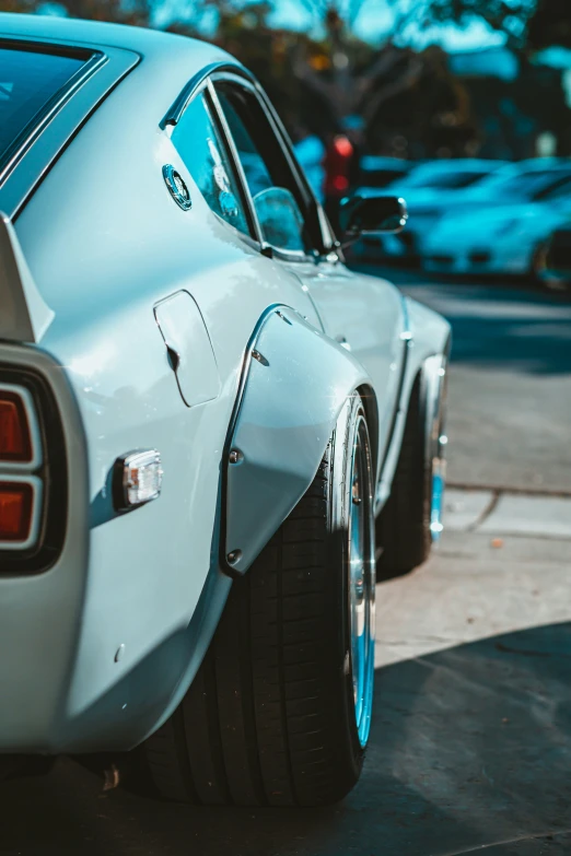 a rear side of a classic muscle car