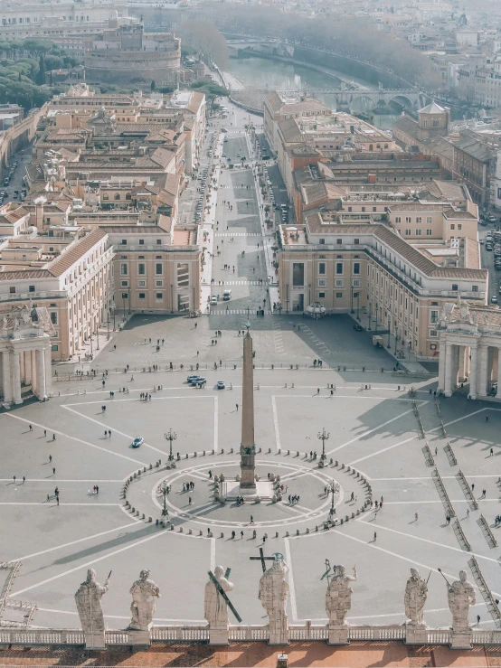 the aerial view of a city showing a clock tower