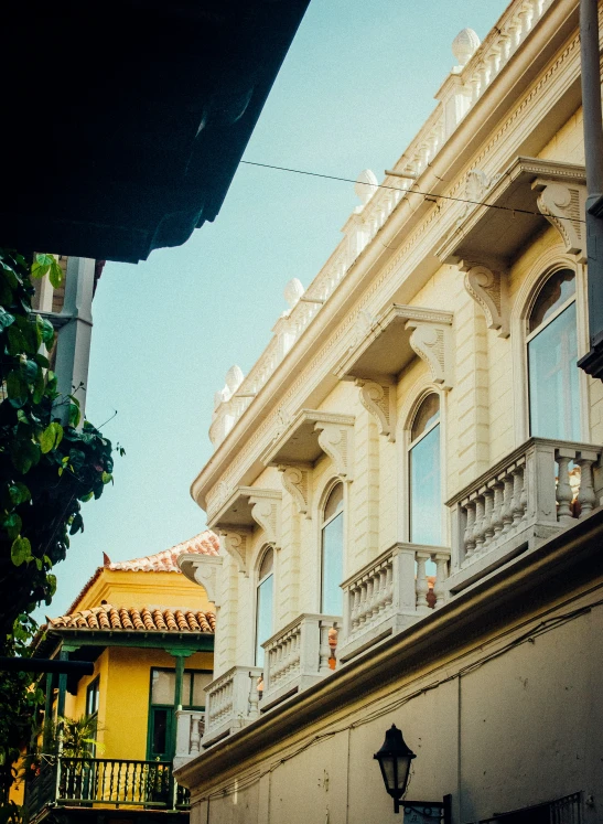 two buildings sitting next to each other and a street light