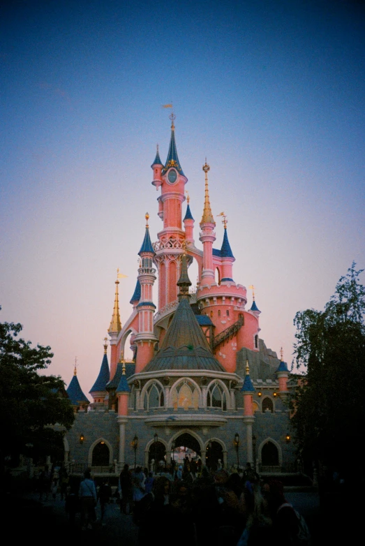 a large building with many spires at night