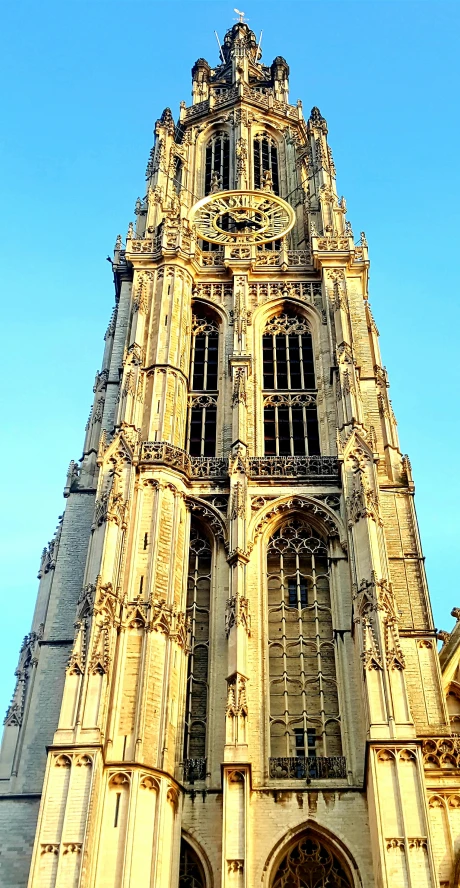 a cathedral with a clock tower in the middle