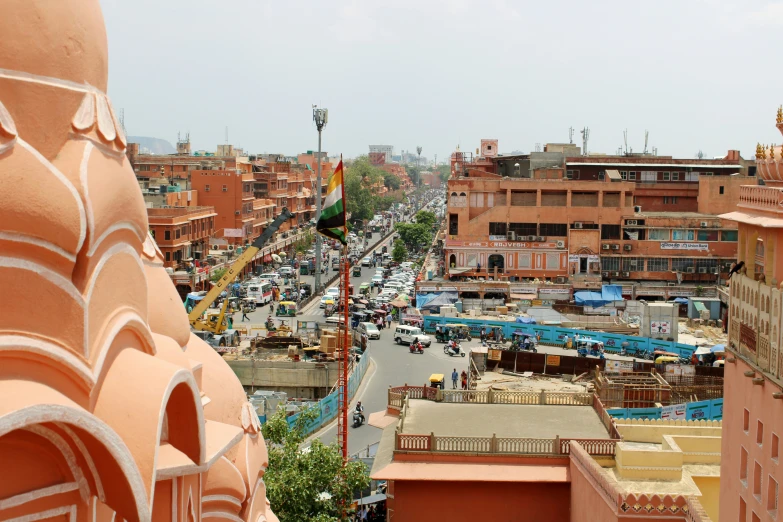 a view looking down the middle of a city, from a large tower