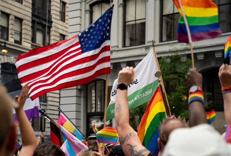 people in the street with american and american flags