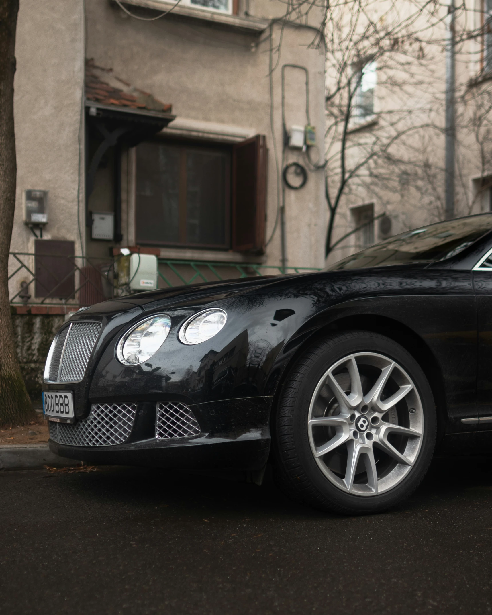 a car parked in front of some buildings