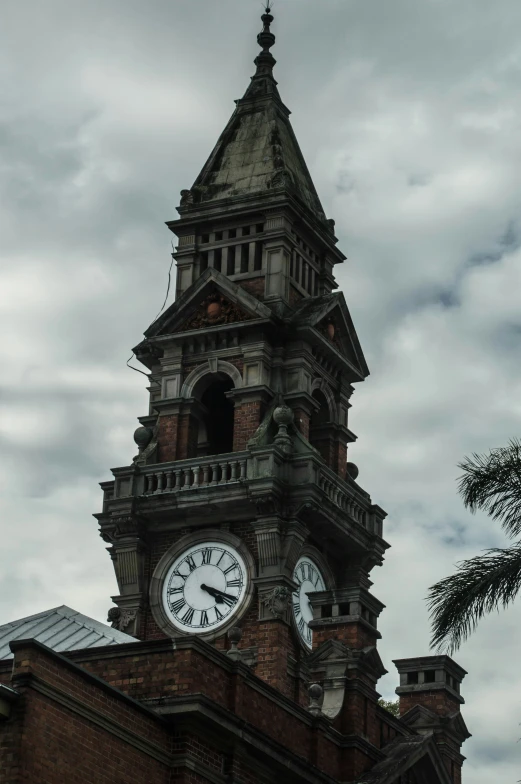 a very tall tower with clocks on each of it's sides