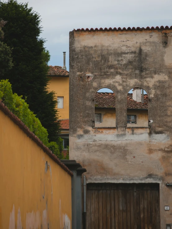 this is an image of a large door in a very old wall