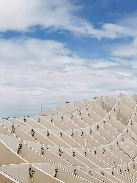 a bunch of sand formations against the blue sky