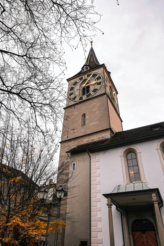 a church building with a clock at the top