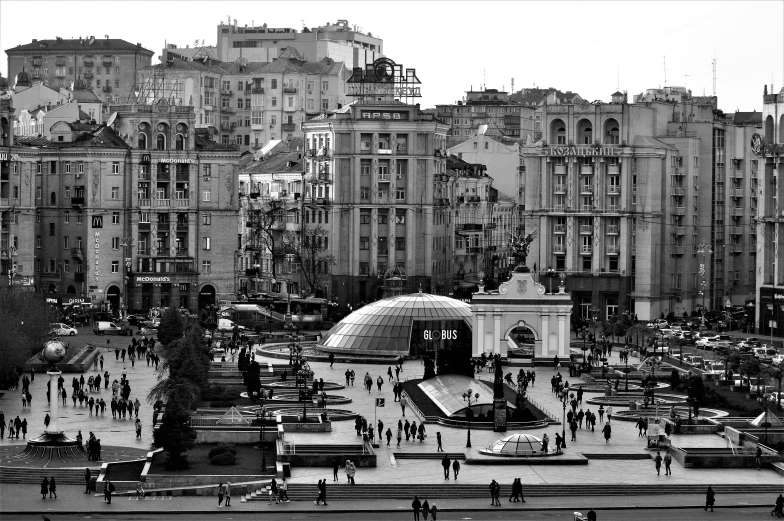 city skyline with a fountain and buildings