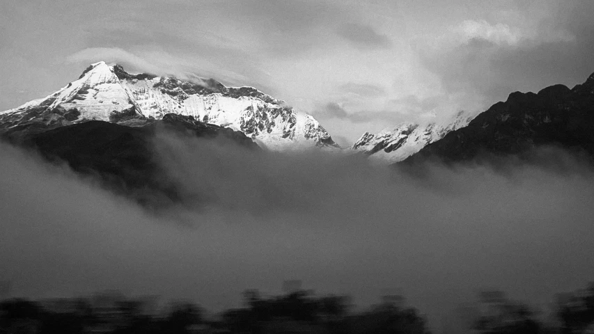 a black and white po of the mountain tops