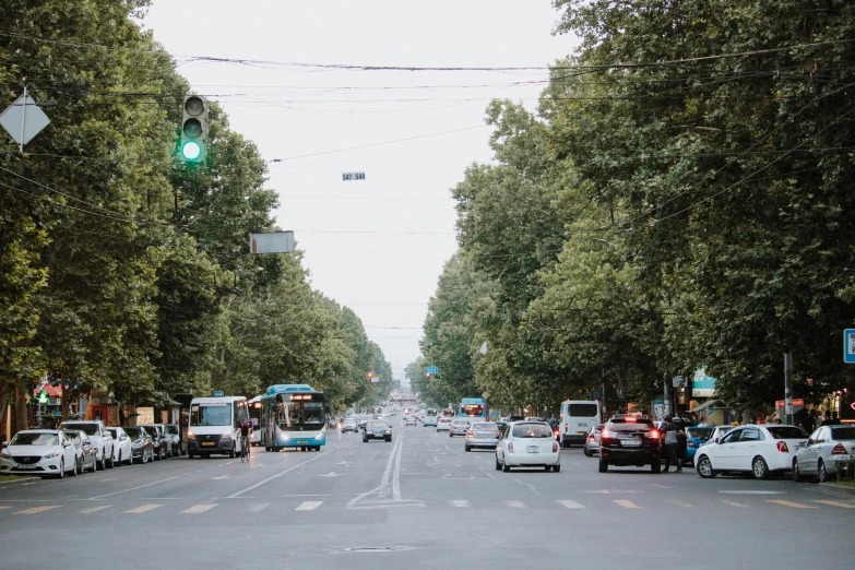 cars traveling through the center of an intersection