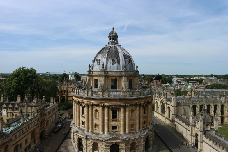 the top of a building with large windows on it