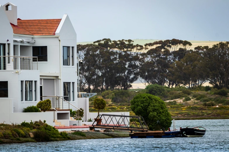 a couple of boats parked in front of a building