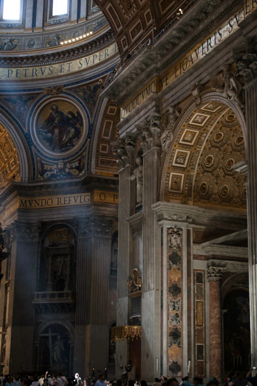 some very ornate paintings on a church wall