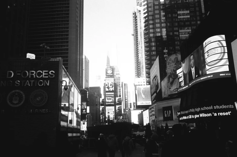 the street in the city with people and a few buildings