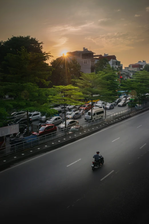 a person is riding a motorcycle down the road