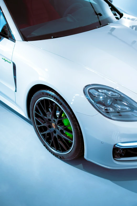 a white car parked inside of a building