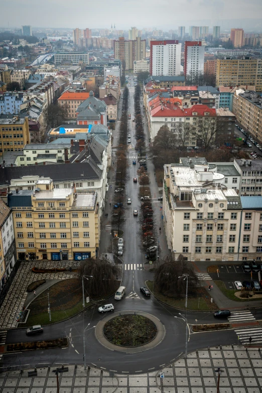 a road in front of a city with buildings