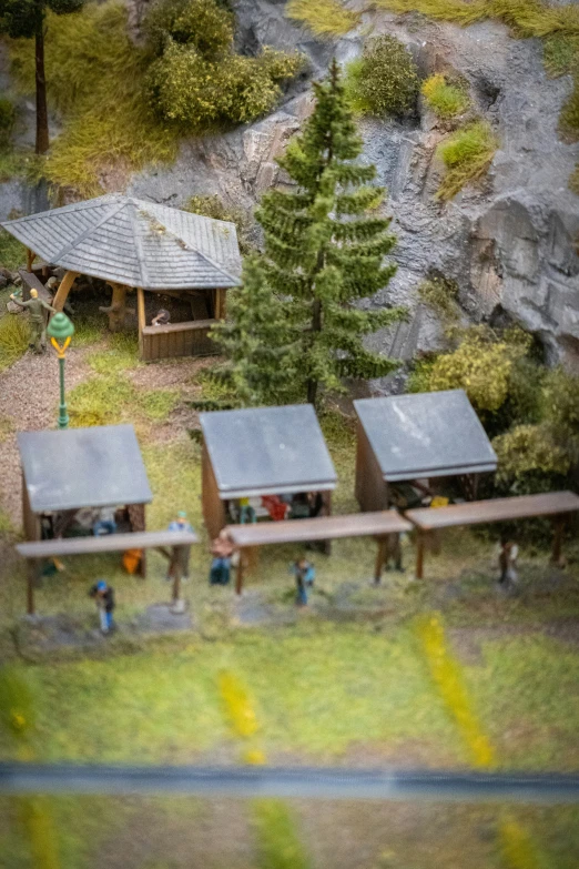 aerial view of small wooden cabins and trees